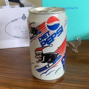 Vintage Pepsi Diet Can with Skiing penquins Graphic in Red and Blue